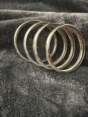 Set of Five Silver Tone Metal Bangles